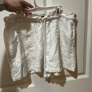 white linen shorts with rope tie